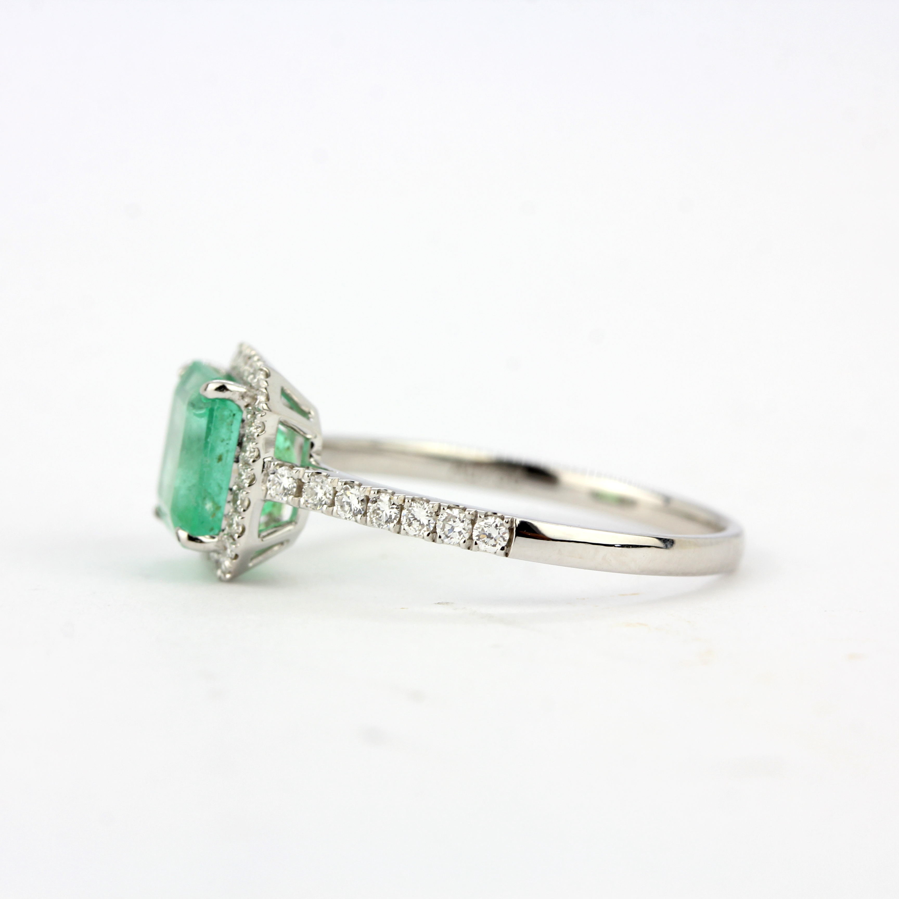 An 18ct white gold ring set with an emerald cut emerald and diamonds, ring size P. - Image 2 of 3