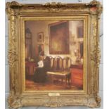 A gilt framed oil on canvas interior scene after C. Holsoe (1863-1935), frame size 68 x 77cm.