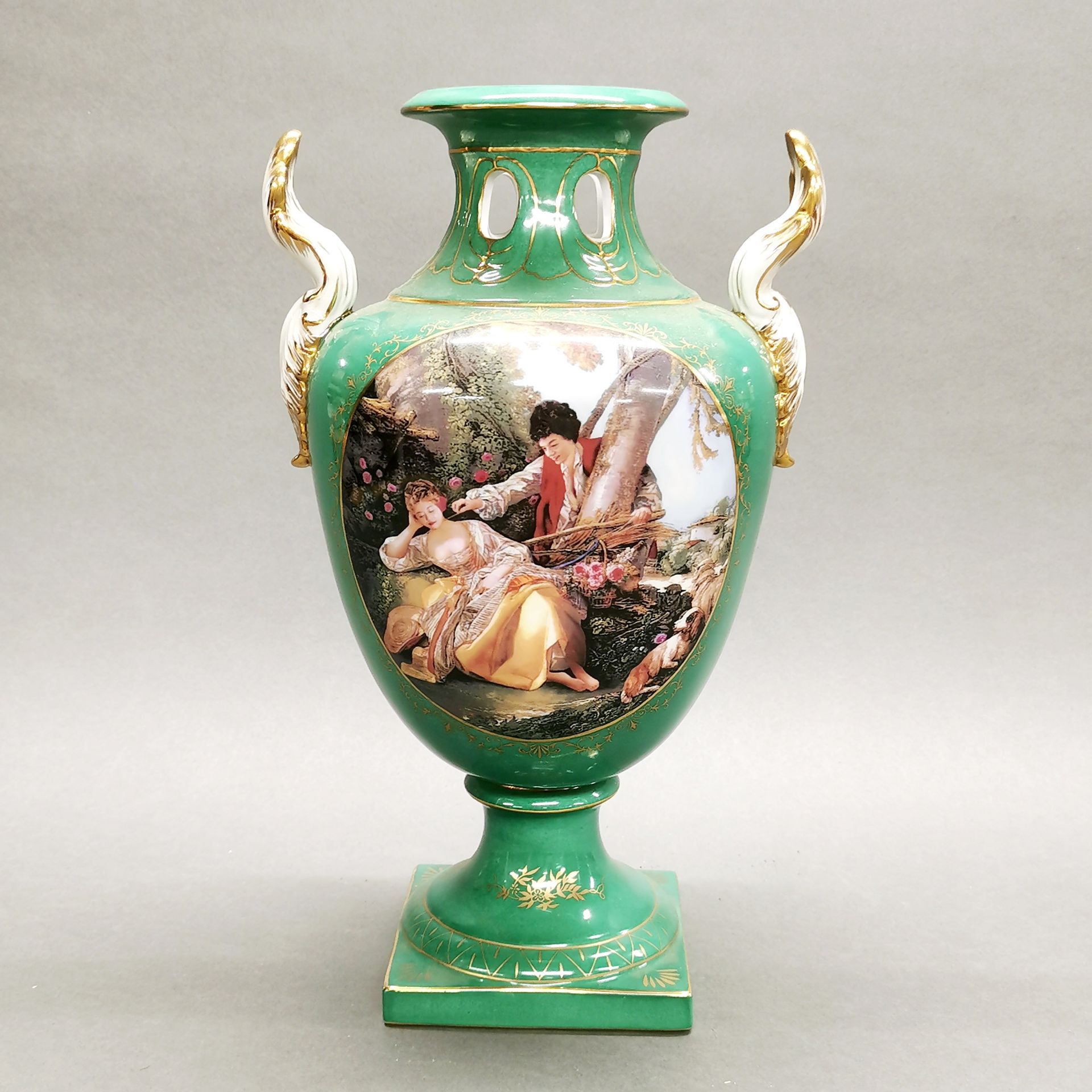 A large continental porcelain urn, H. 39cm.