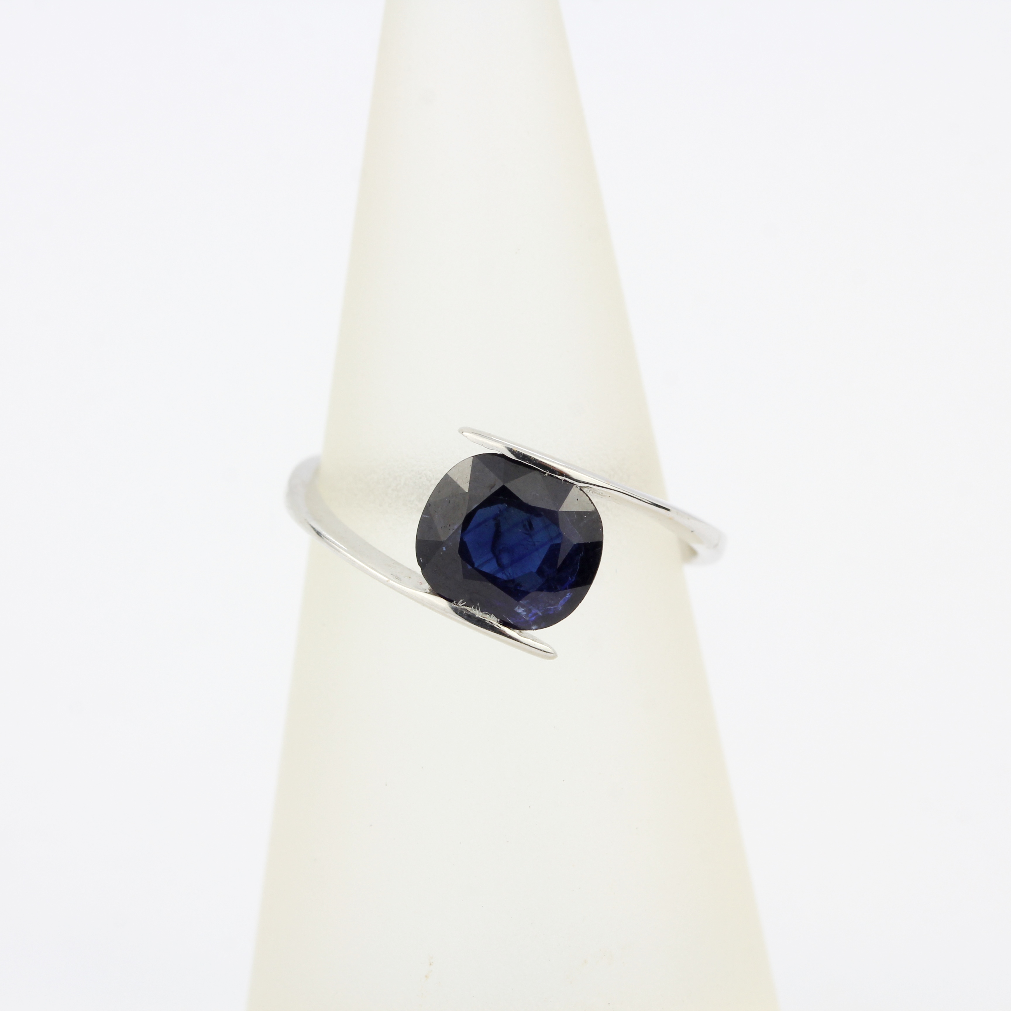 An 18ct white gold (tested) ring set with a 1.9ct cushion cut royal blue sapphire, ring size L. - Image 3 of 3