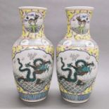 A pair of large Chinese hand enamelled porcelain vases, H. 44cm.