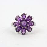 A 925 silver amethyst set cluster ring, ring size S.