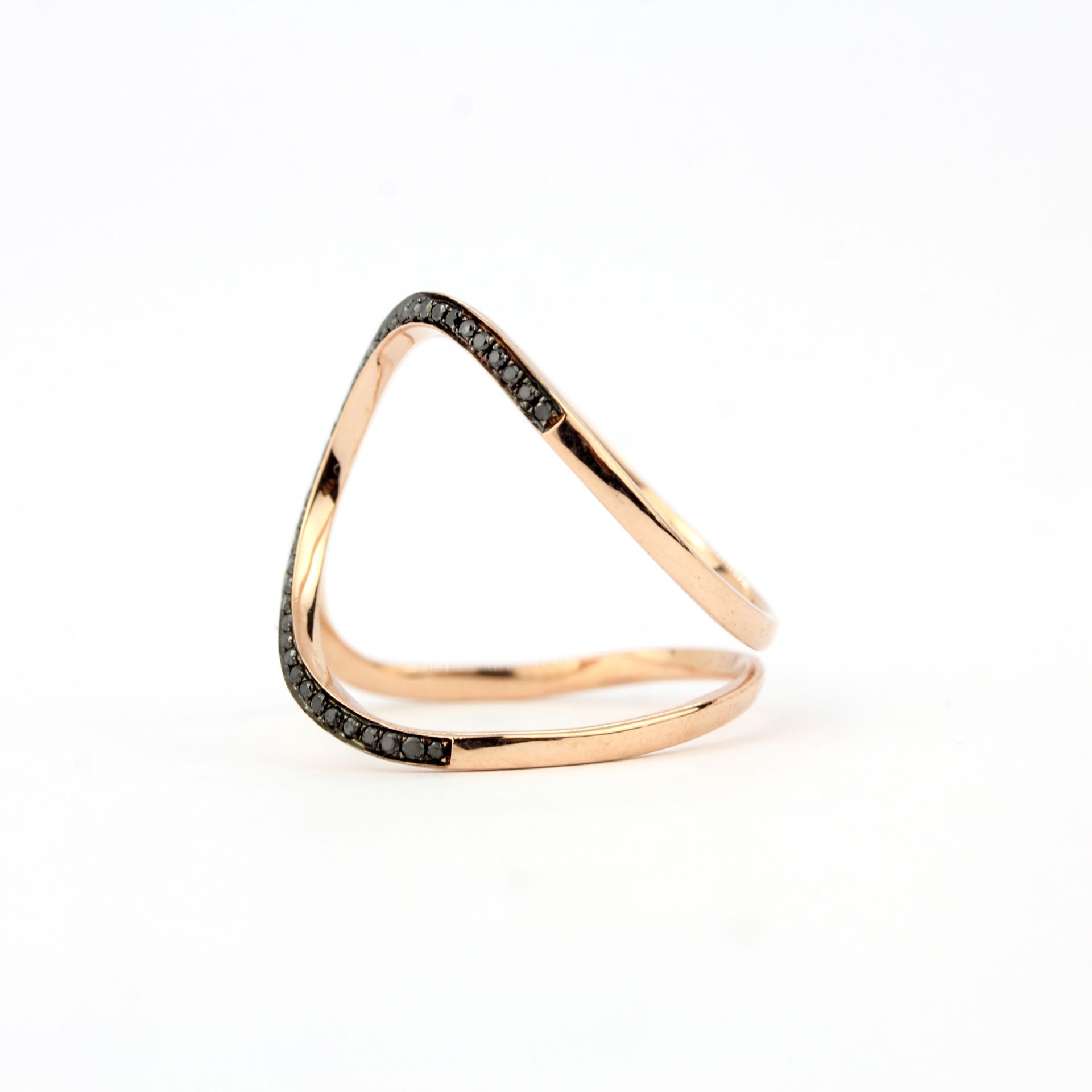 A 9ct rose gold ring set with brilliant cut fancy black diamonds, ring size P.5. - Image 3 of 3