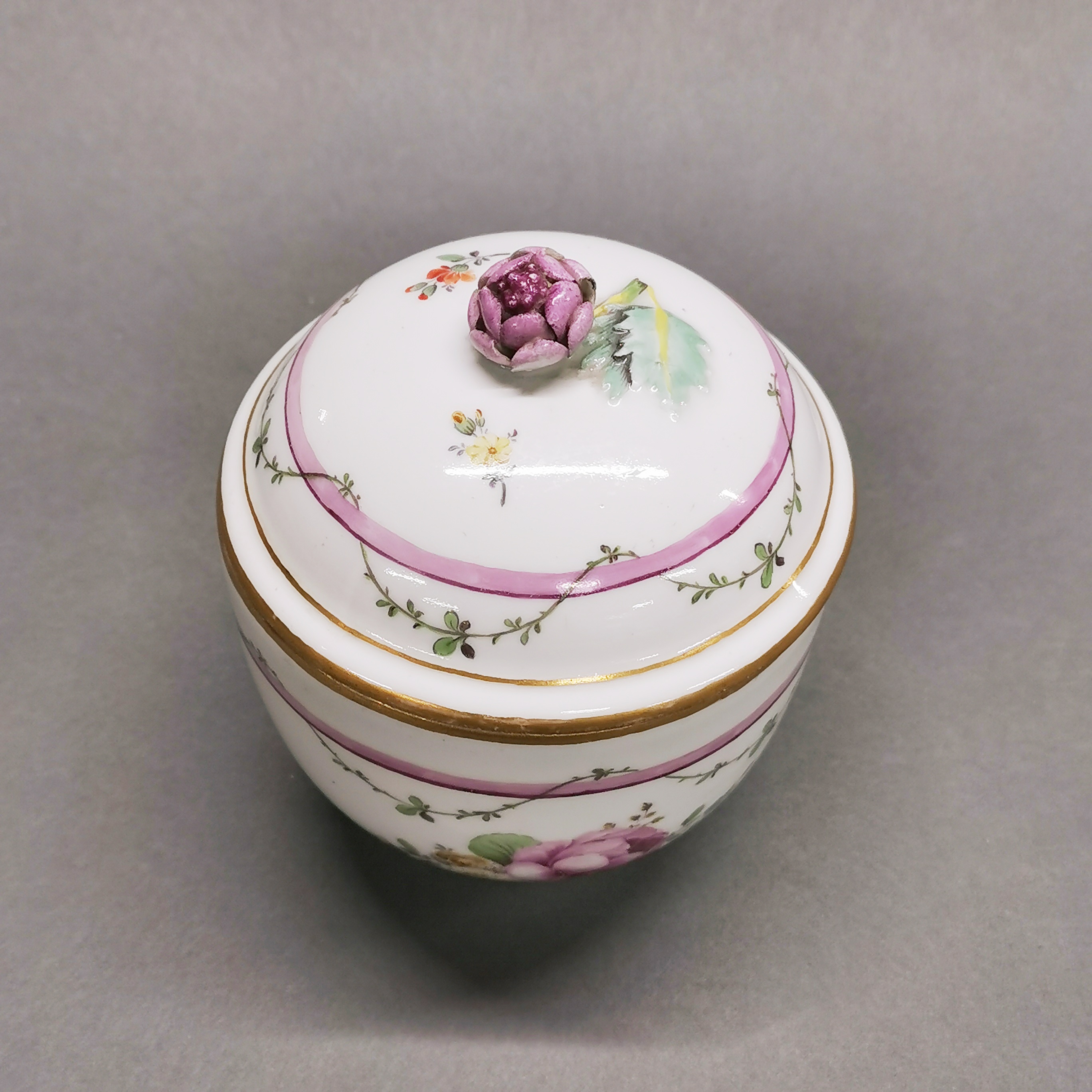 A 19thC Furstenberg porcelain pot and cover, H. 12cm. - Image 2 of 4