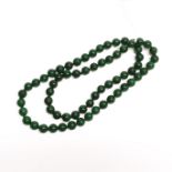 A single strand jade bead necklace, bead size 11.5mm, necklace L. 78cm.