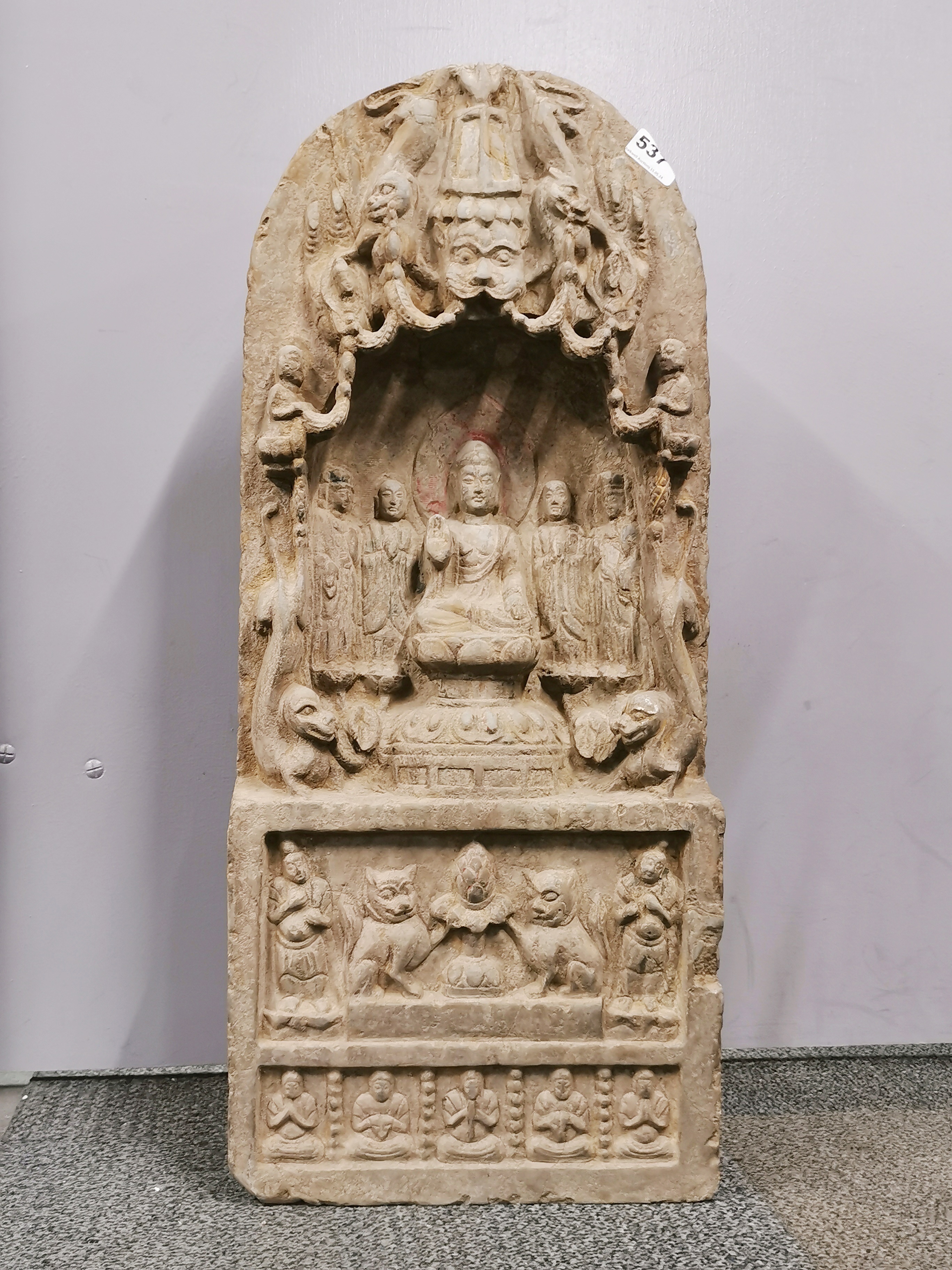 A superb old Chinese carved stone Buddhist devotional shrine, H. 75cm.