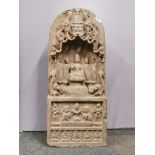 A superb old Chinese carved stone Buddhist devotional shrine, H. 75cm.