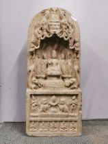 A superb old Chinese carved stone Buddhist devotional shrine, H. 75cm.