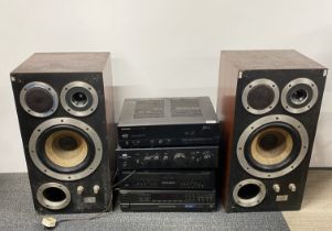 A Pioneer vintage Hi-Fi system and two speakers.