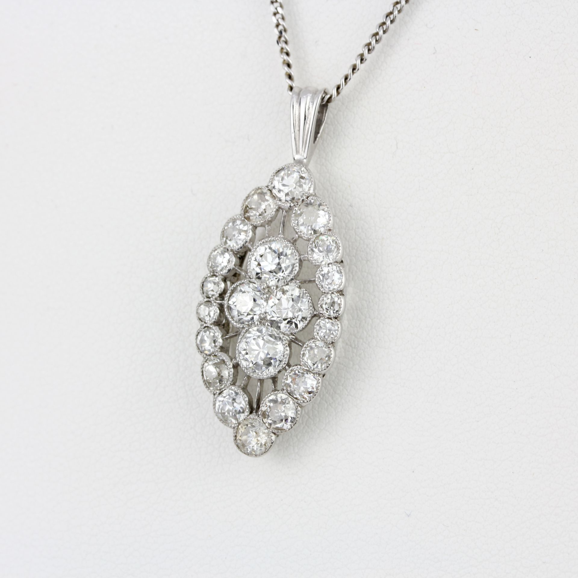 An 18ct white gold diamond set pendant and chain, set with old cut diamonds, approx. 2.65ct overall, - Image 2 of 4