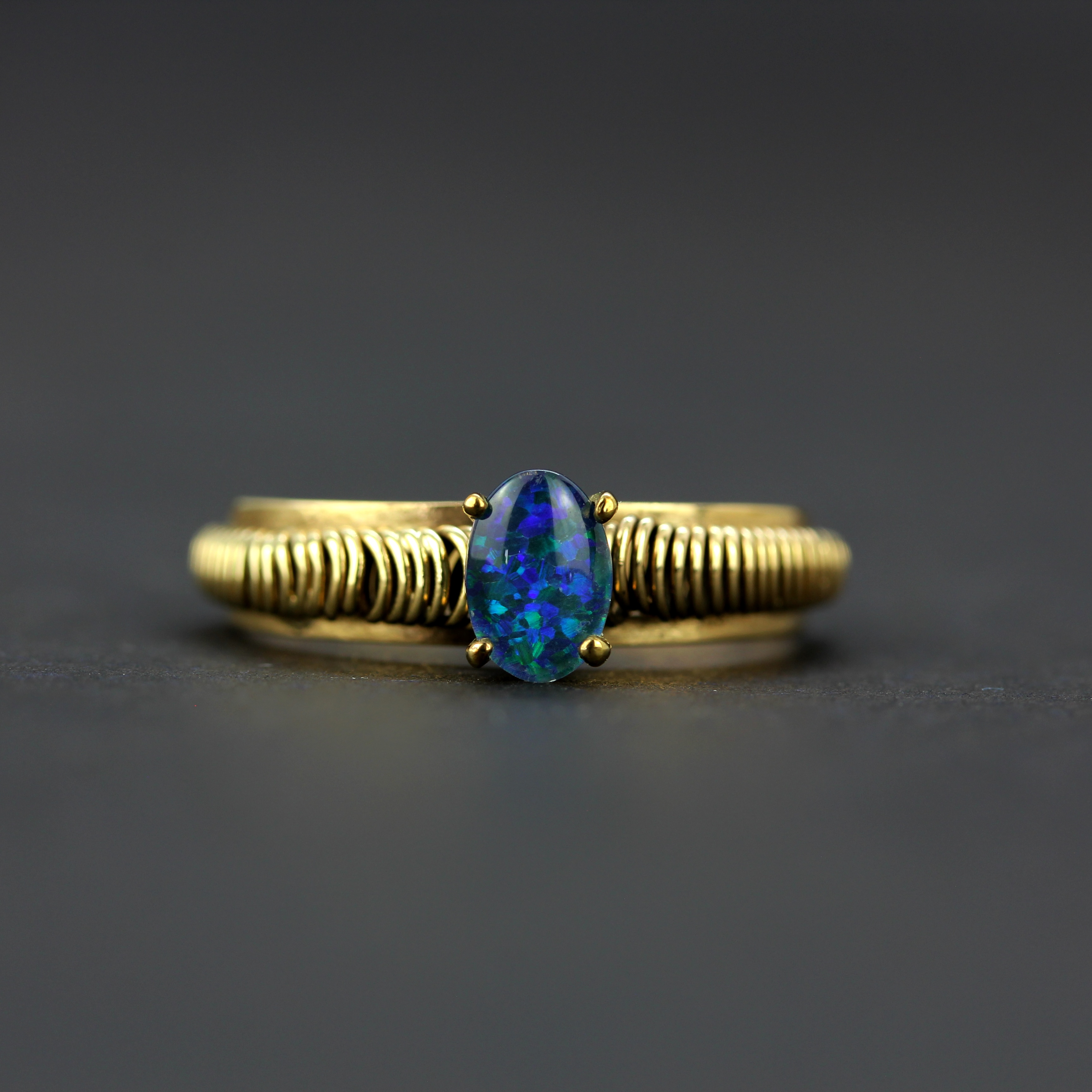 A 9ct yellow gold ring set with an opal doublet, ring size R.5, together with a yellow metal (tested - Image 2 of 5