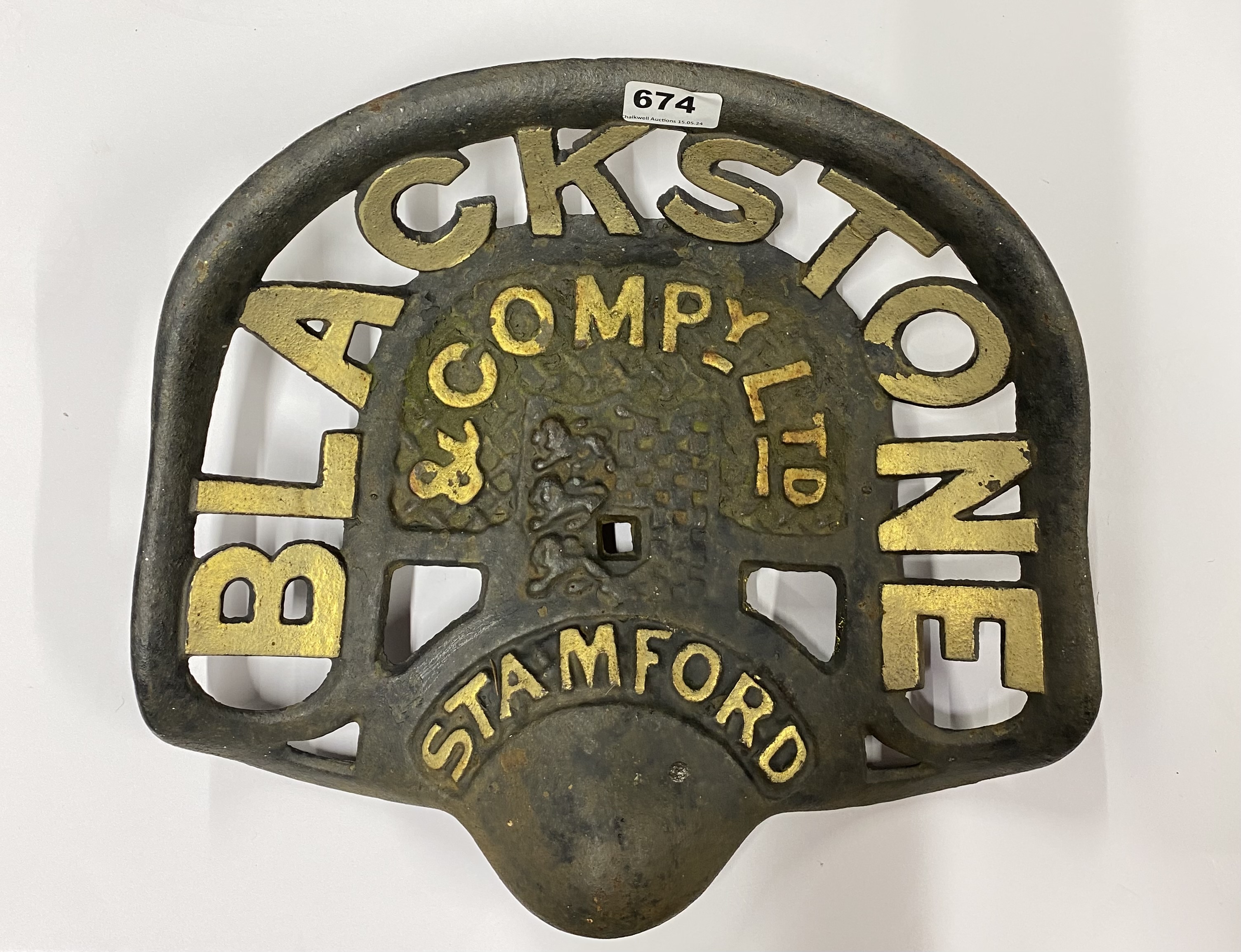 An original cast iron Blackstone and company tractor seat.