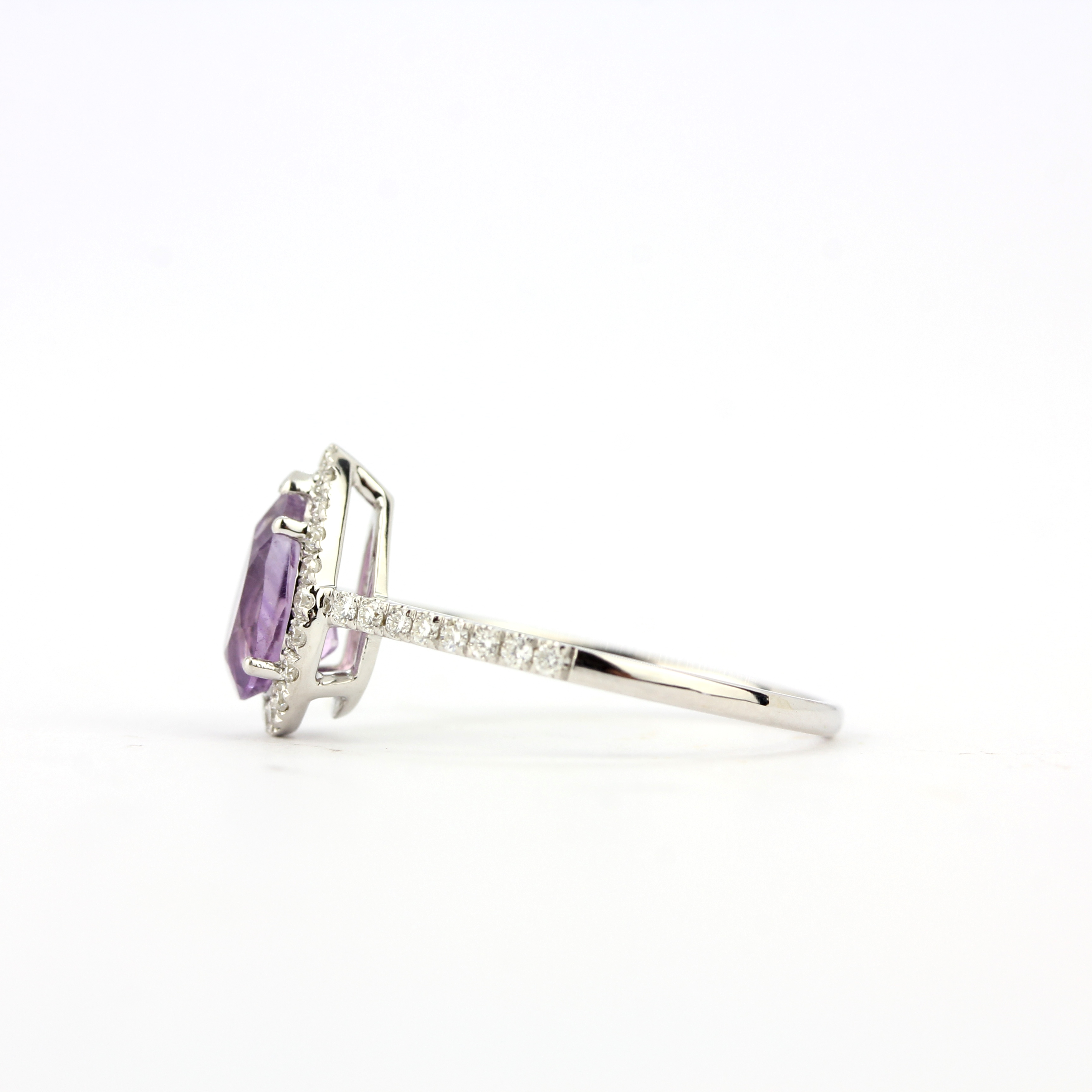 A 9ct white gold ring set with a pear cut amethyst and diamonds, ring size N. - Image 2 of 3