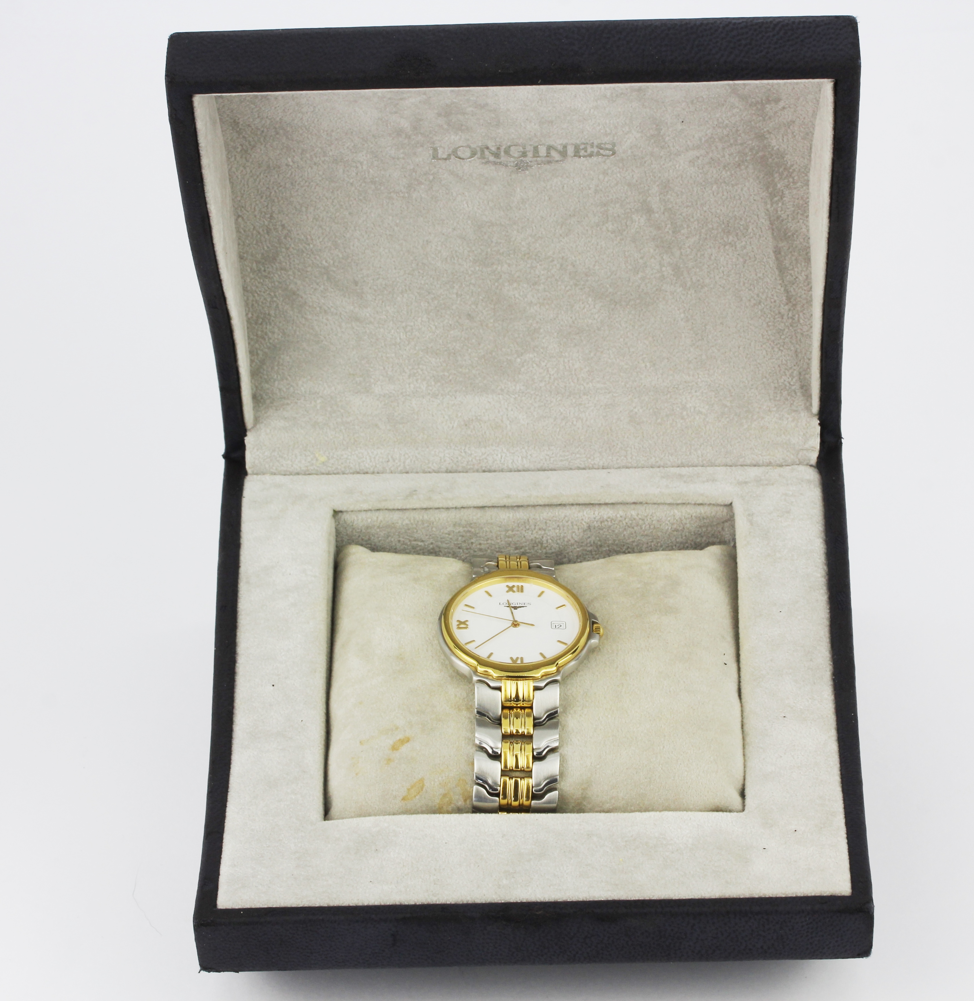 A boxed gentleman's Longines stainless steel wrist watch with extra links and paperwork.