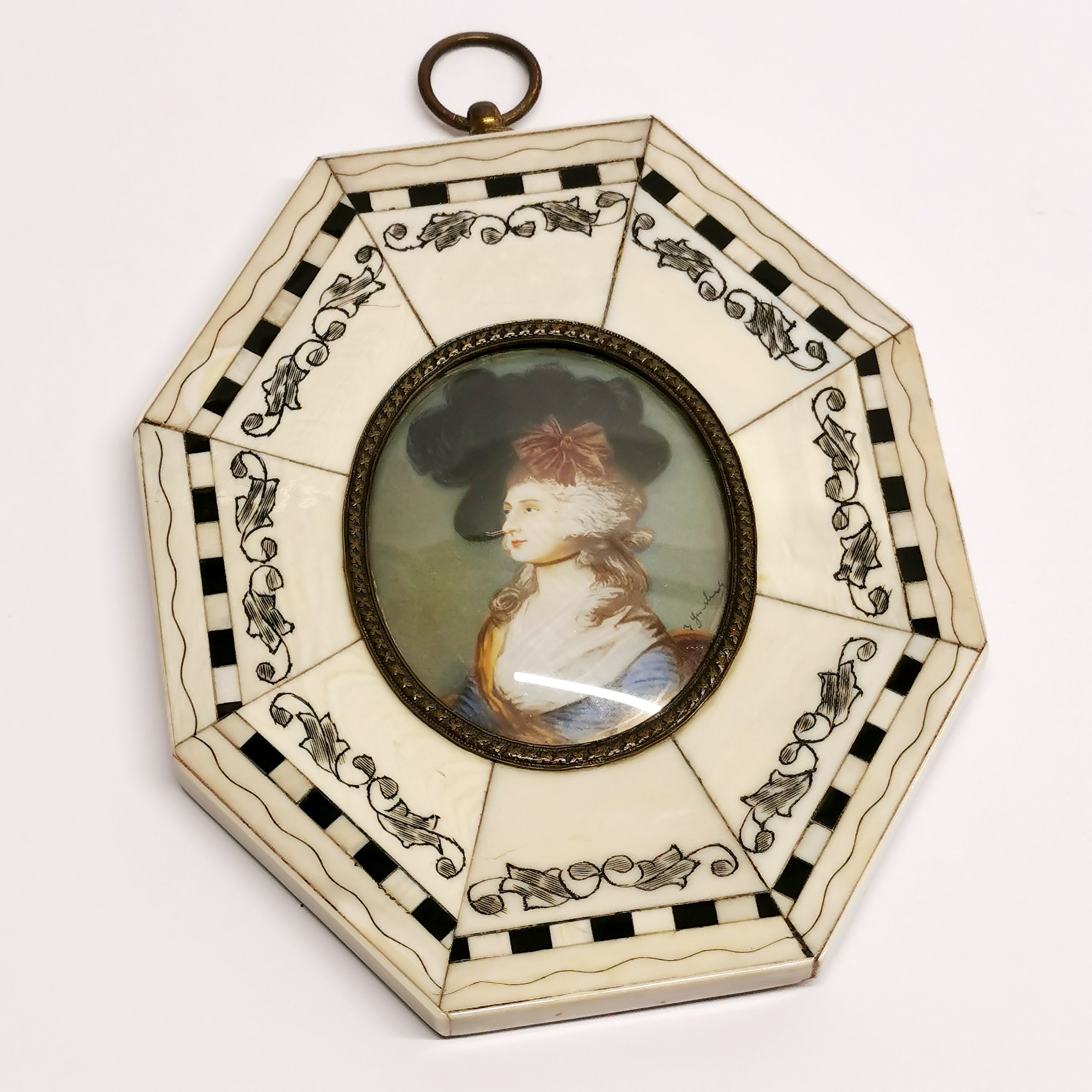 A framed portrait miniature understood to be Sarah Siddons after Gainsborough, H. 13cm.
