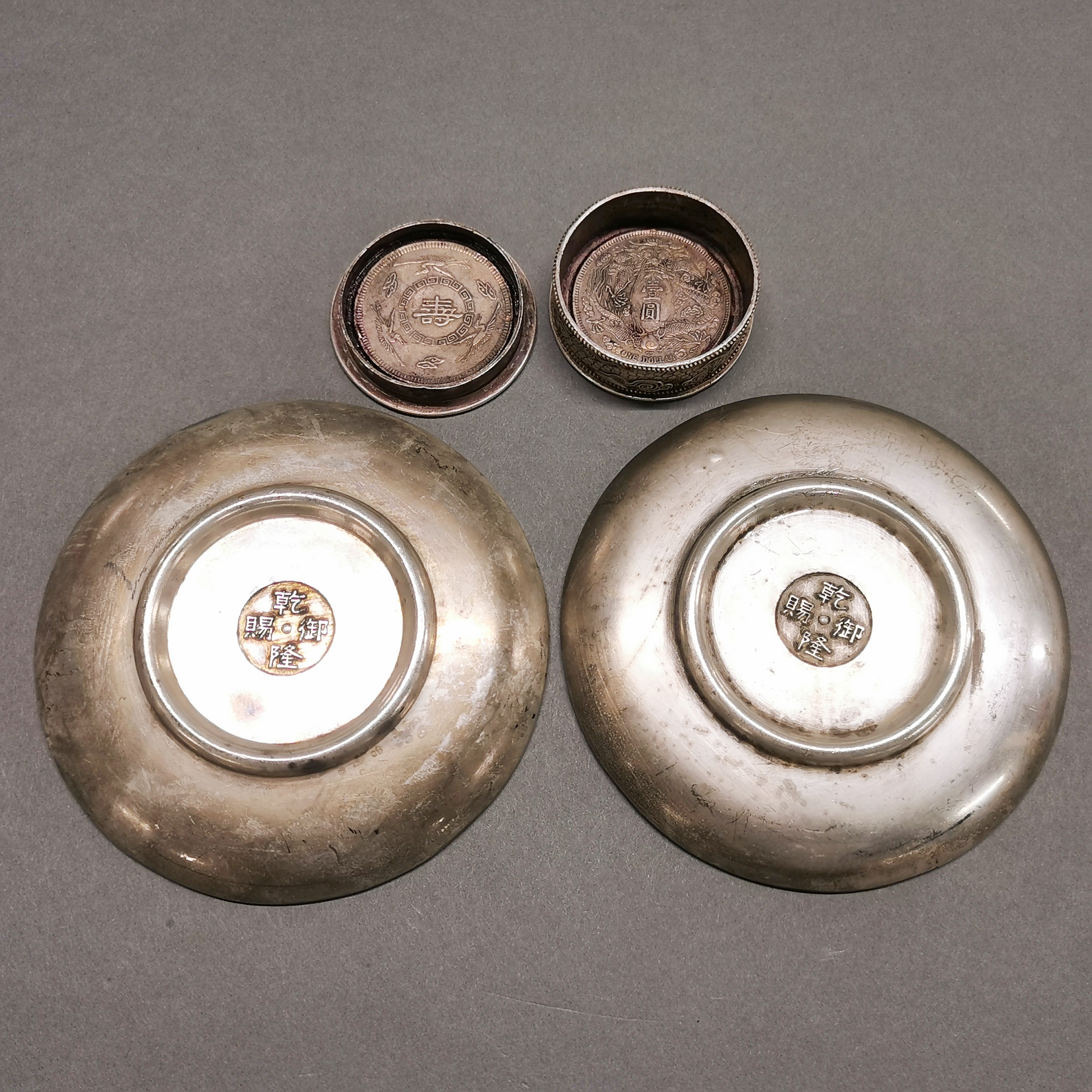 Two Chinese silvered metal dishes, dia. 12cm. Together with a silvered metal ink box. - Image 2 of 2