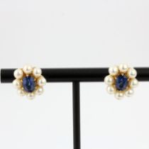 A pair of 9ct yellow gold earrings set with oval cut sapphires surrounded by pearls, L. 1.3cm.