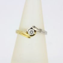 A 14ct yellow and white gold diamond set solitaire ring, approx. 0.33ct, ring size O.