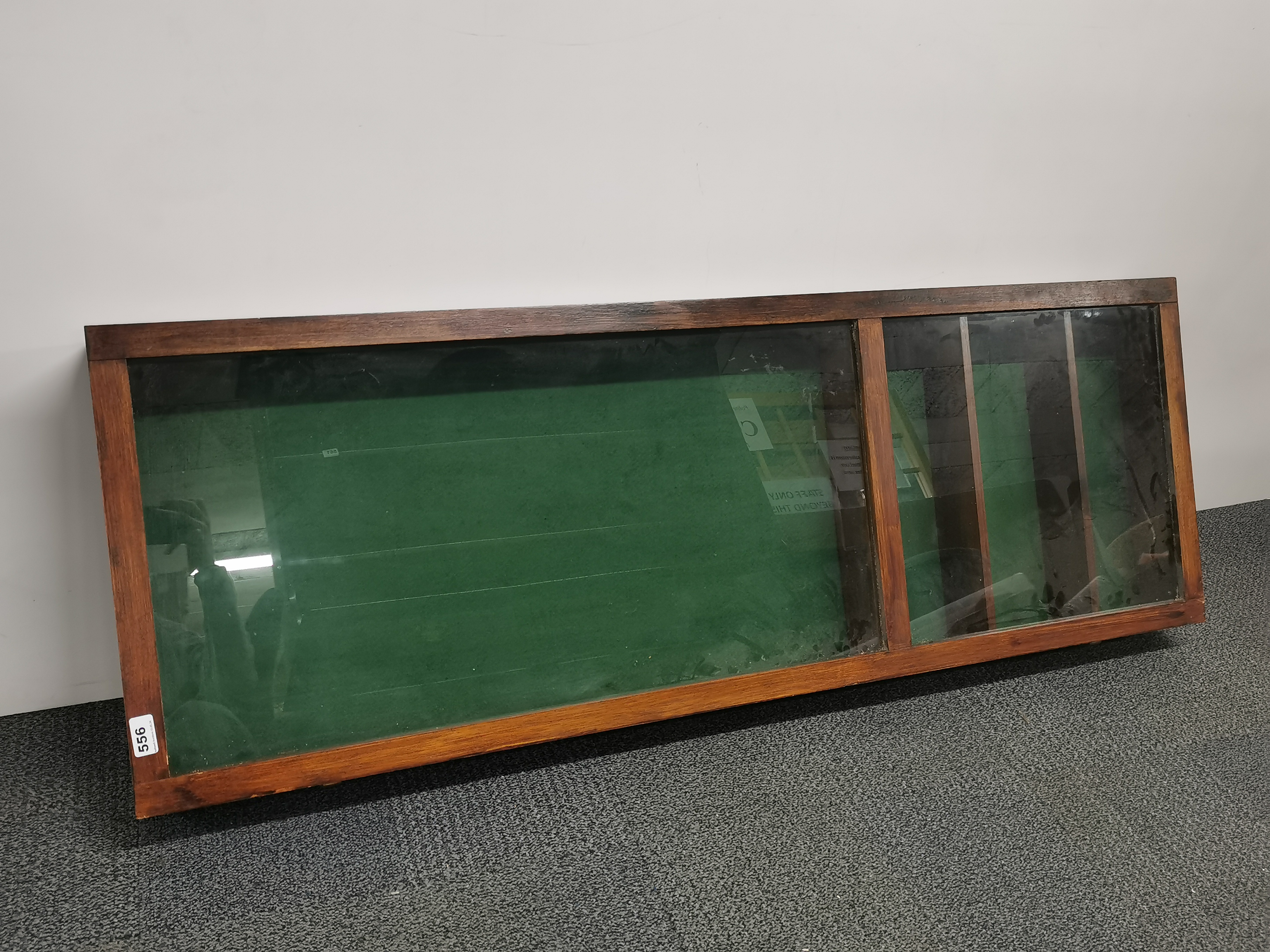 A useful large wall mounted / table top mahogany display cabinet, 48 x 140 x 12cm.