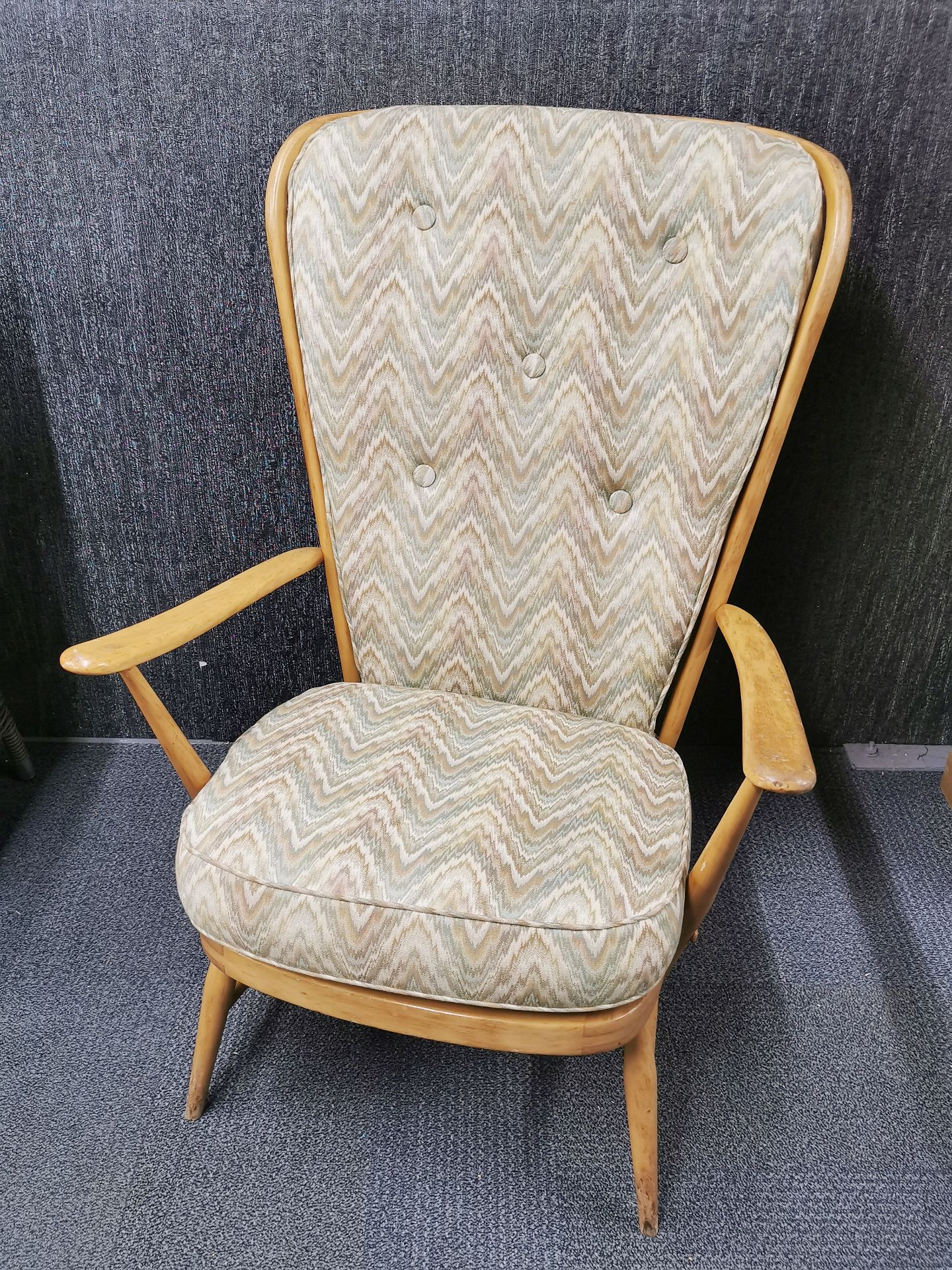 An Ercol cottage style armchair.