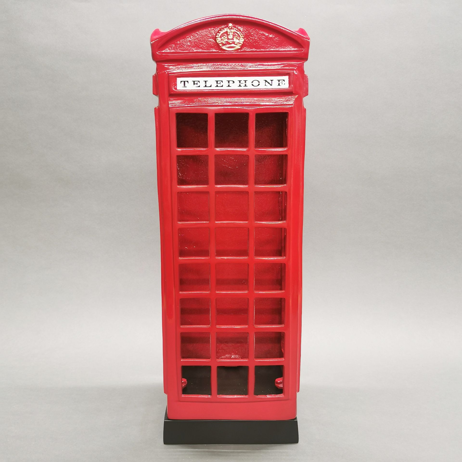 An interesting painted metal telephone box walking stick stand, H. 88cm.