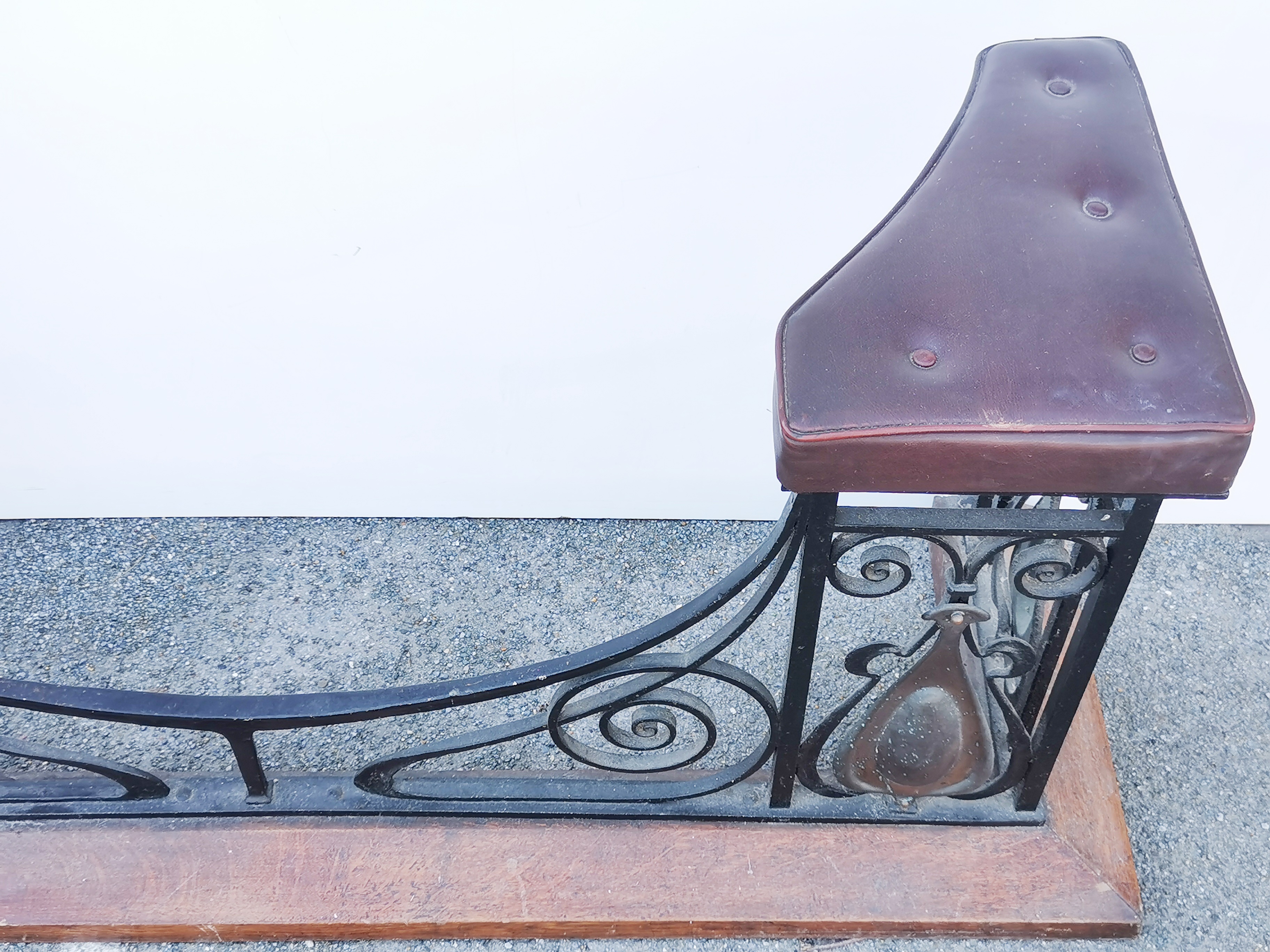 A large Art Nouveau 20thC upholstered iron and oak fireplace fender seat, W. 180cm. - Image 5 of 5