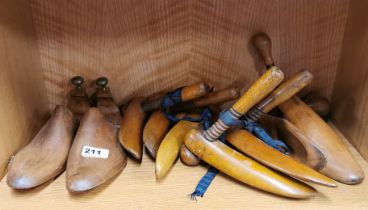 A group of antique shoe trees.