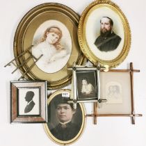 A Victorian framed hand finished photographic portrait of a young women, with a small easel, H.