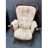 An Ercol style cottage armchair.