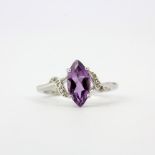 A 9ct white gold ring set with a marquise cut amethyst and diamonds, ring size N.5.