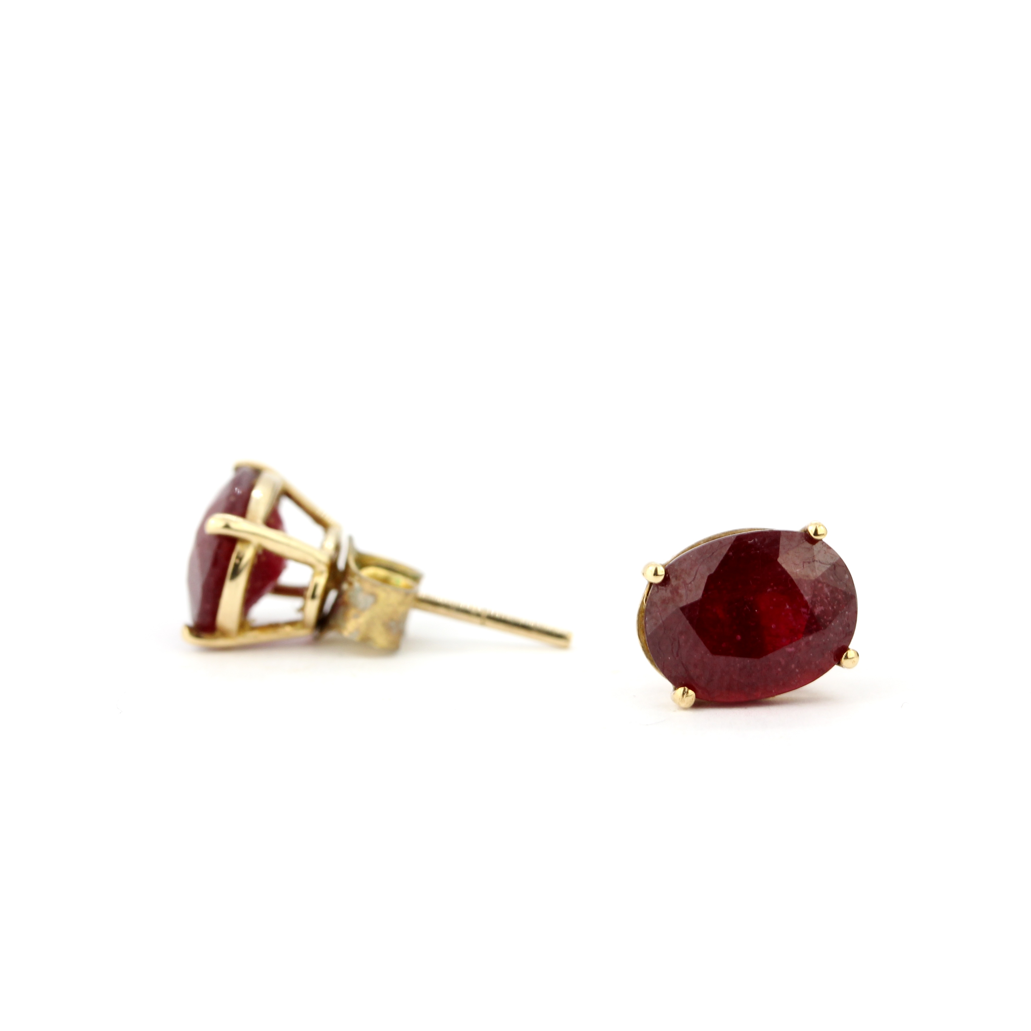 A pair of 9ct yellow gold ruby set stud earrings, L. 0.9cm, one butterfly replaced. - Image 3 of 3