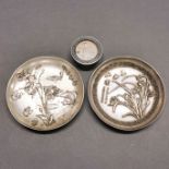 Two Chinese silvered metal dishes, dia. 12cm. Together with a silvered metal ink box.