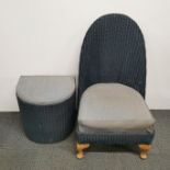 A Lloyd loom bedroom chair and linen basket.