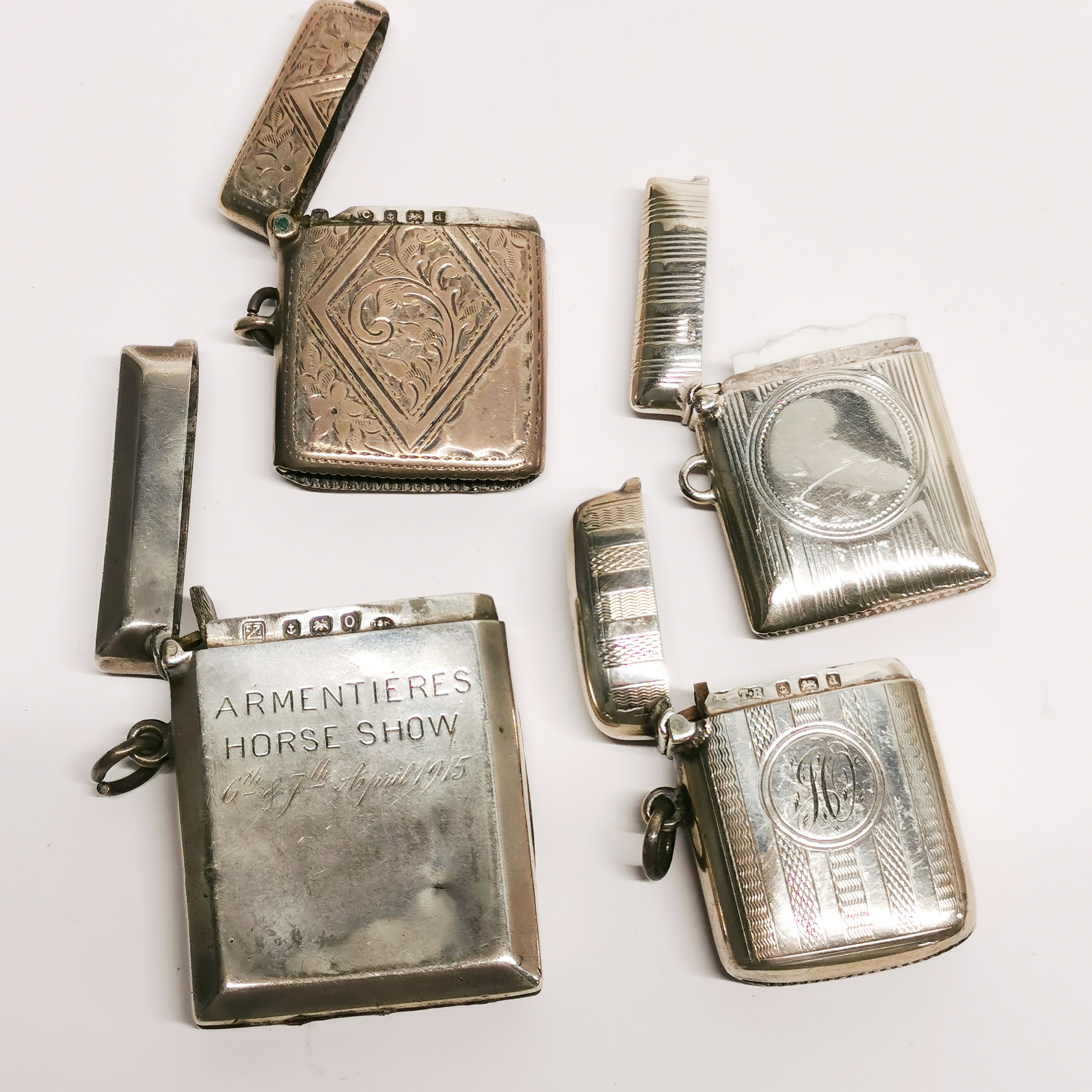 A group of four hallmarked silver vesta cases, includes a case marked for a trench horse show at - Image 2 of 2