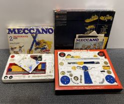 Two boxed Meccano sets.