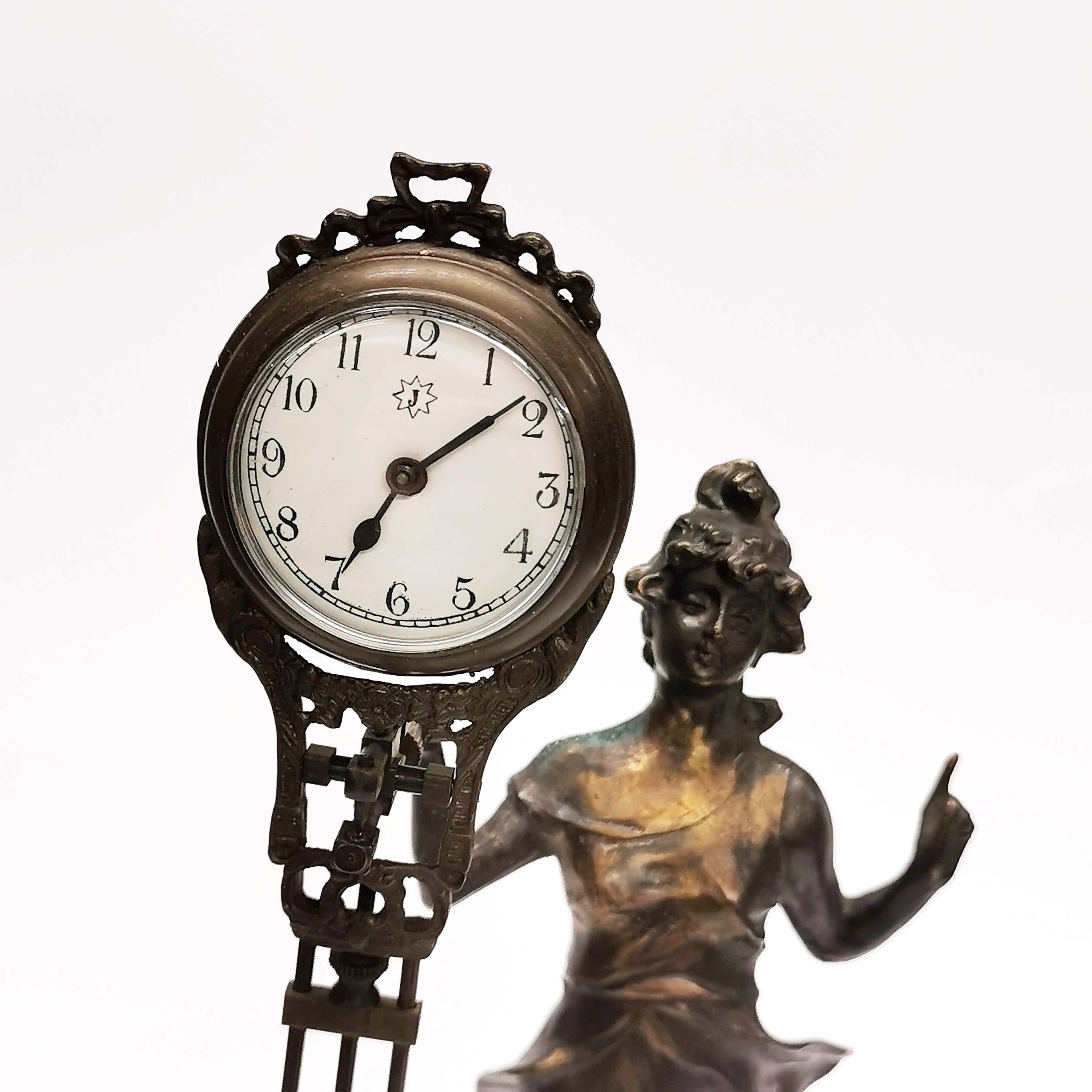 An Art Nouveau style bronze clock, H. 34cm. - Image 3 of 4