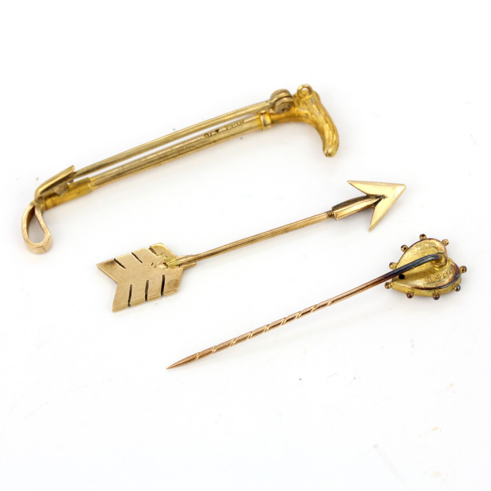 A 9ct yellow gold brooch together with two 9ct gold tie pins, L. 4.5 and 4cm. - Image 2 of 2
