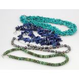 Four bead necklaces : turquoise, lapis lazuli, hematite and nephrite.