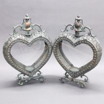 A pair of heart shaped metal and glass garden lanterns, H. 52cm.