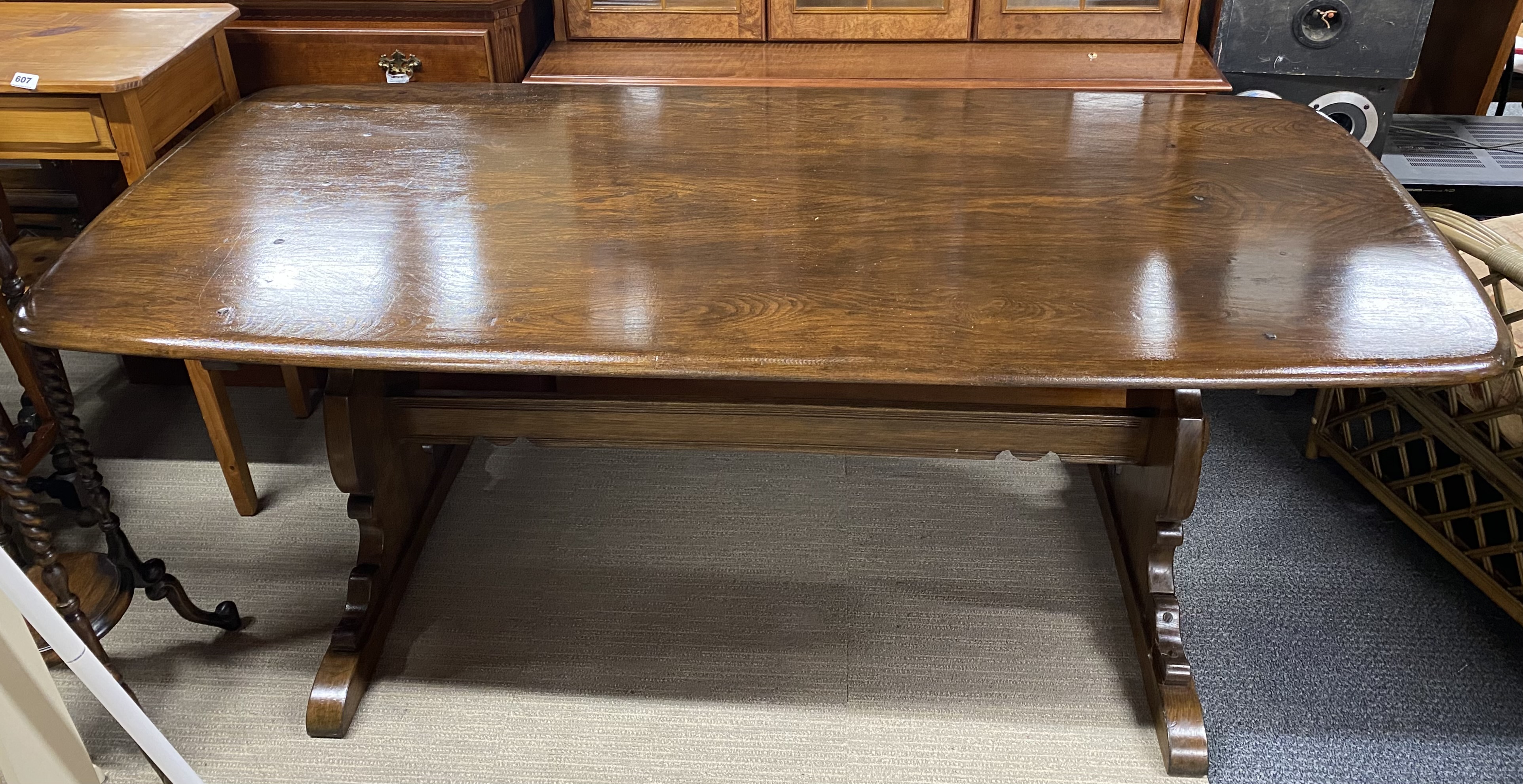 An Ercol 'Old Colonial' oak refectory table with antique waxed finish, L. 183cm.