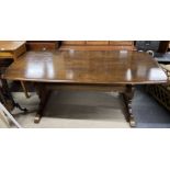 An Ercol 'Old Colonial' oak refectory table with antique waxed finish, L. 183cm.