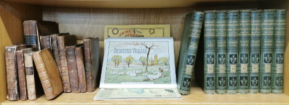 A group of mixed early leather bound books with three children's picture books and a set of