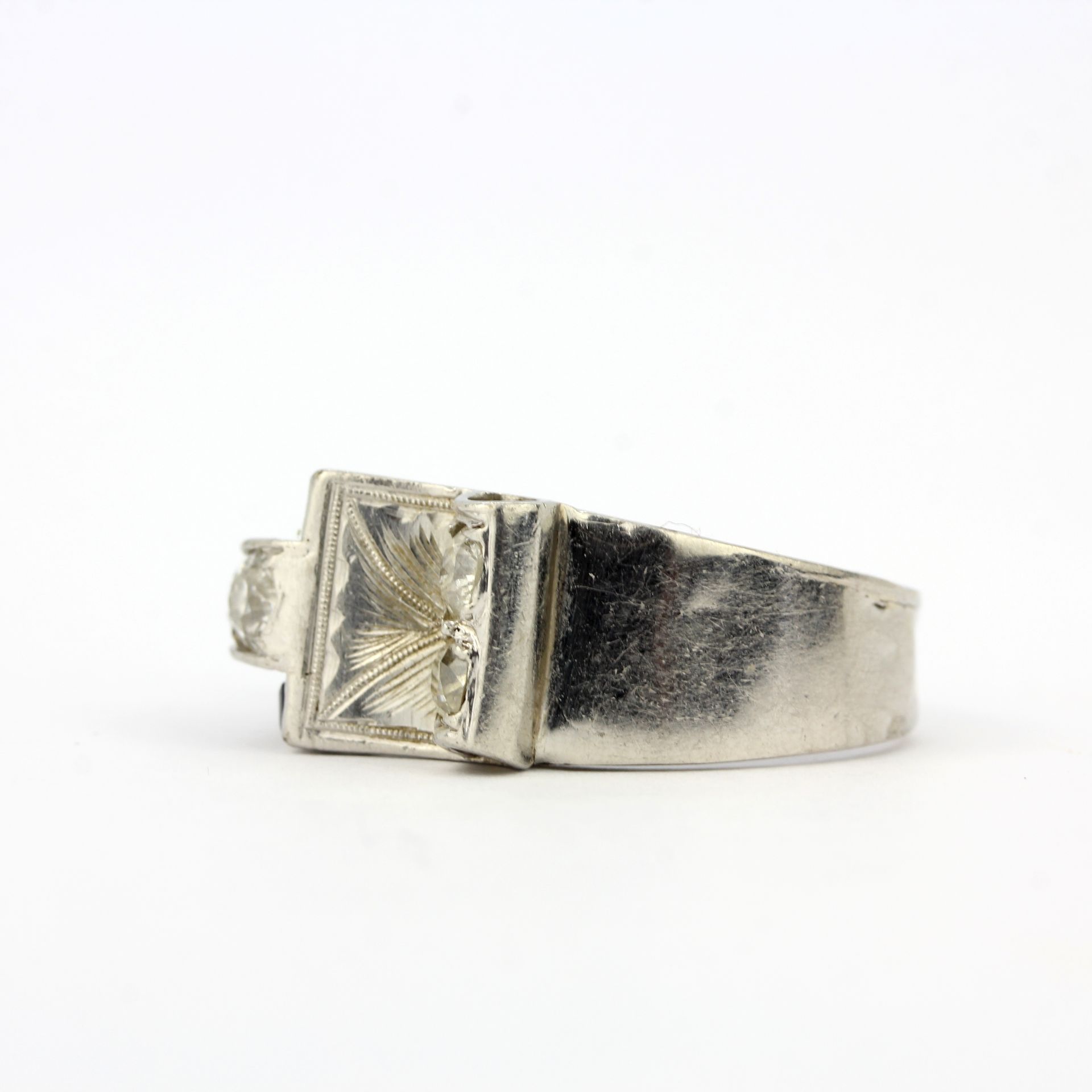 A white metal (tested minimum 9ct gold) ring set with step cut sapphires and old brilliant cut - Image 3 of 4