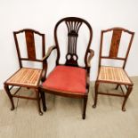 A mahogany lyre back carver dining chair together with two further dining chairs.