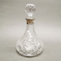 A silver collared cut crystal decanter, H. 27cm.
