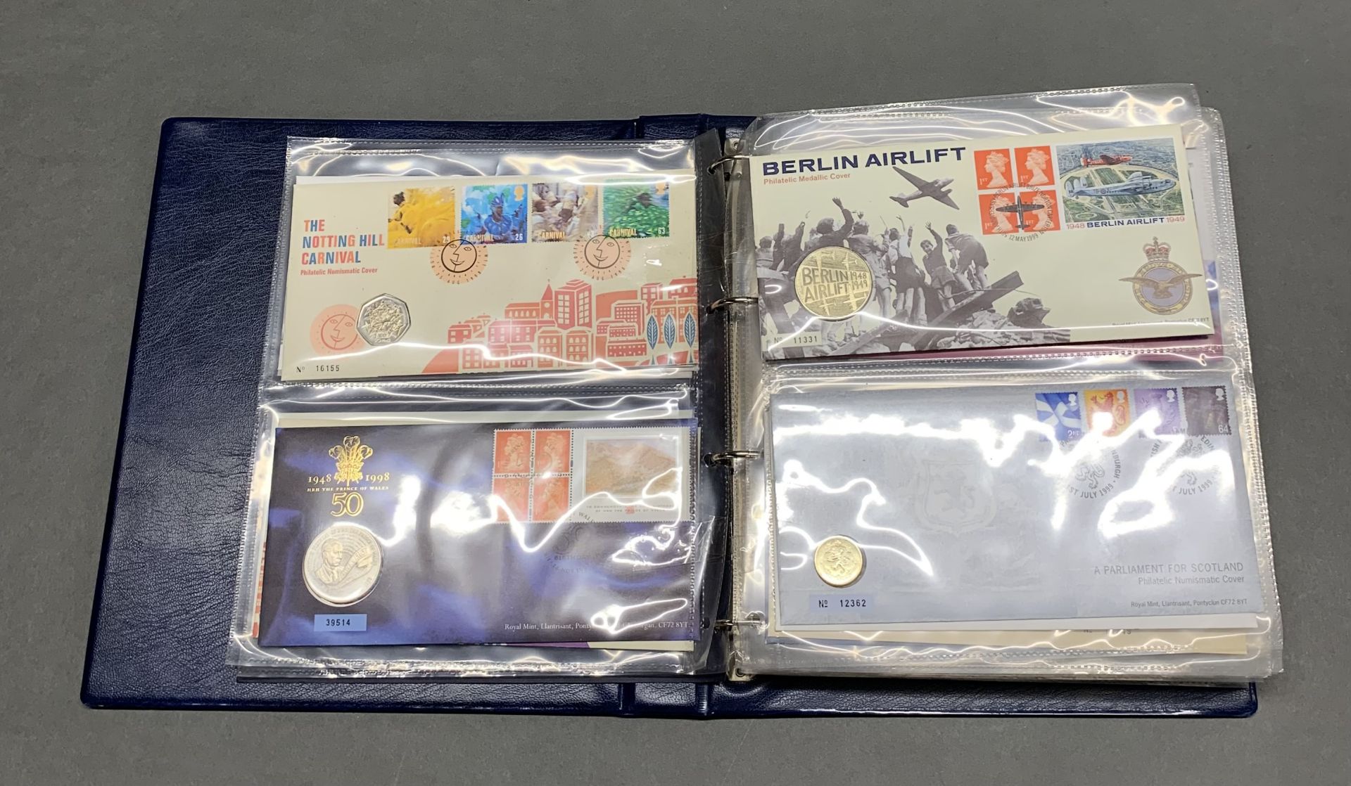 A quantity of numismatic Royal mint and other first day stamp covers. - Image 2 of 2