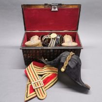 A early 20th century cased Naval bicorn hat, belt, sash and epaulets. Noted on the lid for L. J.