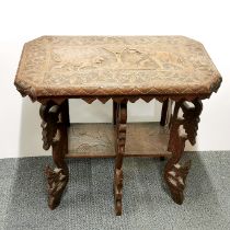 An eastern carved hardwood table, size. 68 x 38 x 64cm.