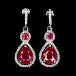A pair of 925 silver drop earrings set with pear and round cut rubies and white stones, L. 2.9cm.