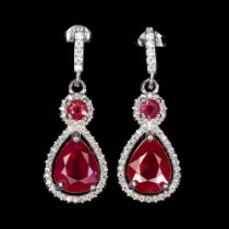 A pair of 925 silver drop earrings set with pear and round cut rubies and white stones, L. 2.9cm.